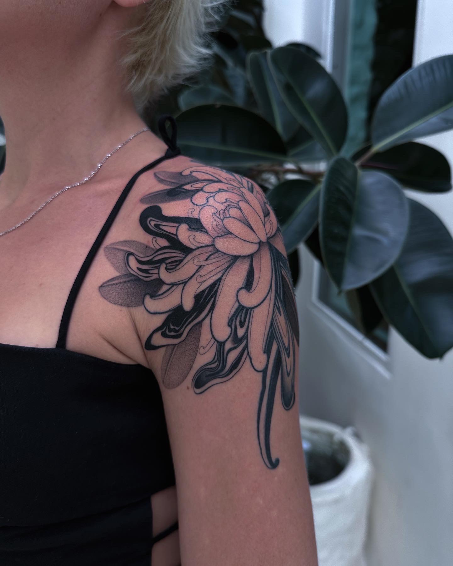 Japanese, Flower, Blackwork, Shoulder Tattoo by Alek. She is a highly skilled tattoo artist at Lethal Ink Tattoo in Pattaya. She is celebrated for her expertise in Japanese, BlackWork, and Abstract styles. Alek, Japanese Flower, Blackwork, Shoulder Tattoo, Lethal Ink, Pattaya, 2024