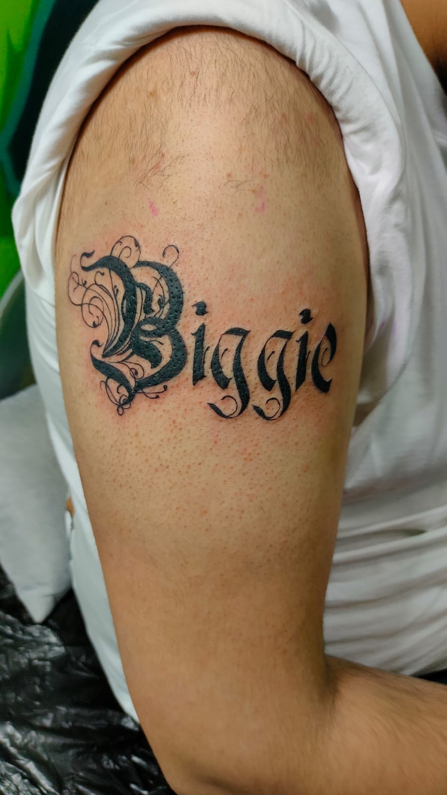 Biggie, Black, Arm Tattoo. We have highly skilled tattoo artists at Lethal Ink Tattoo in Pattaya. We are known for Japanese, Chicano, Realistic, New School, Old School, Neo Thai, Blackwork, and Bamboo Tattooing. Biggie, Black, Arm Tattoo, Lethal Ink, Pattaya, 2024