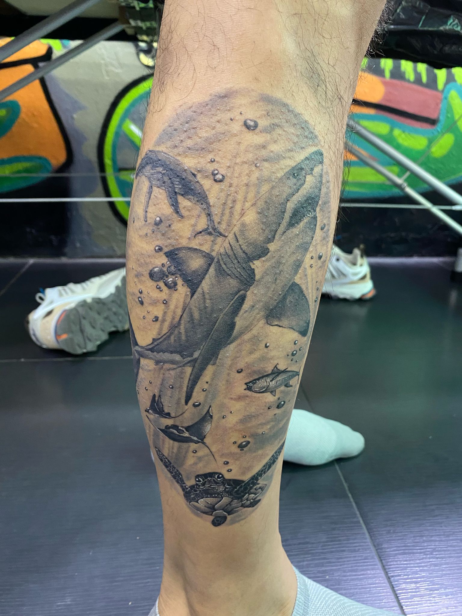 Under the Ocean, Shark, Black and Grey Tattoo. We have highly skilled tattoo artists at Lethal Ink Tattoo in Pattaya. We are known for Japanese, Chicano, Realistic, New School, Old School, Neo Thai, Blackwork, and Bamboo Tattooing. Under the Ocean, Shark, Black and Grey Tattoo, Lethal Ink, Pattaya, 2024