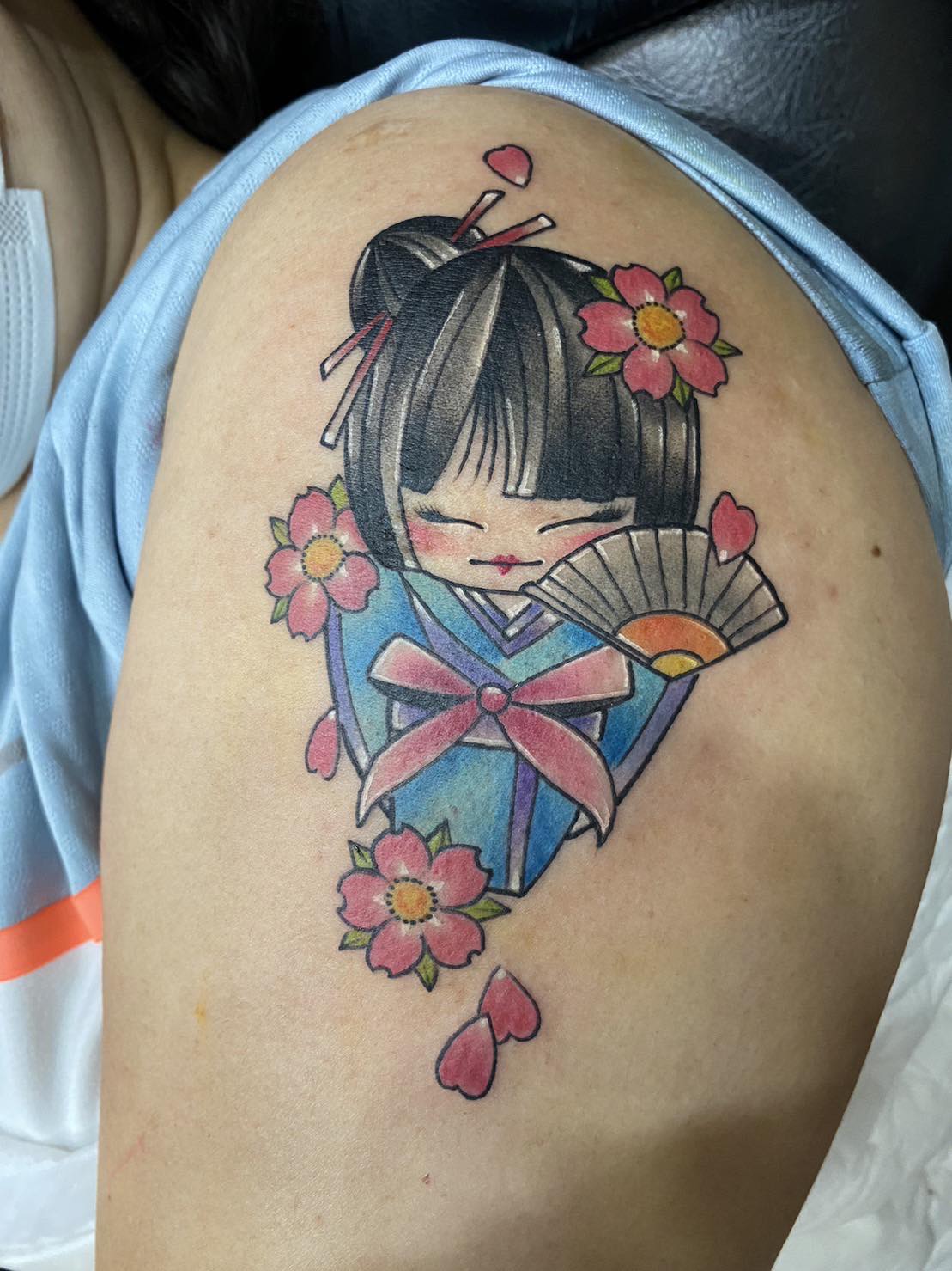 Japanese, Color, Floral, Shoulder, Character Tattoo by Max. He is a highly skilled tattoo artist at Lethal Ink Tattoo in Pattaya. He is celebrated for is expertise in black and grey, anime, manga, Thai art, and tribal motifs. Max, Japanese, Color, Floral, Shoulder, Character Tattoo, Lethal Ink, Pattaya, 2024