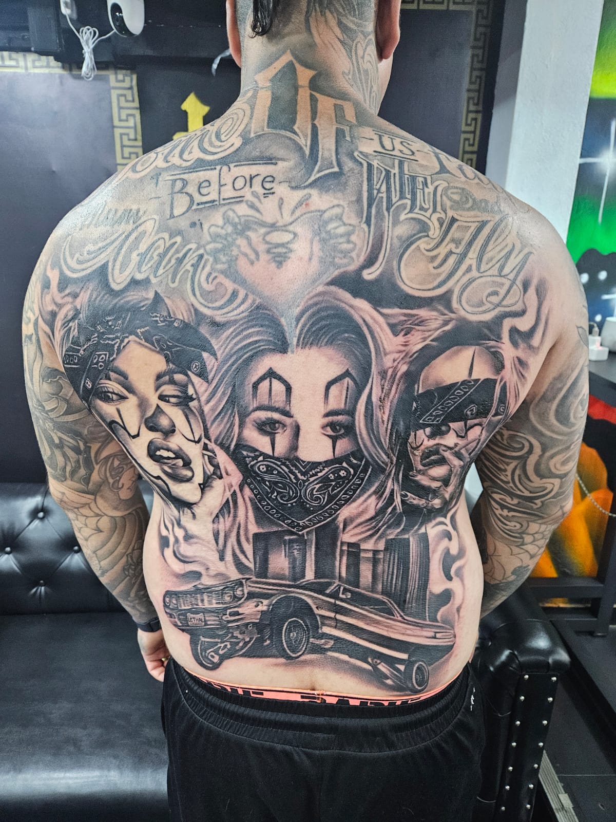 Black and Grey, Chicano, Women, Face, Gangsters, Back Tattoo by Toon. He is a highly skilled tattoo artist at Lethal Ink Tattoo in Pattaya. He is celebrated for is expertise in black and grey, anime, manga, Thai art, and tribal motifs. Toon, Black and Grey, Chicano, Women, Face, Gangsters, Back Tattoo, Lethal Ink, Pattaya, 2024