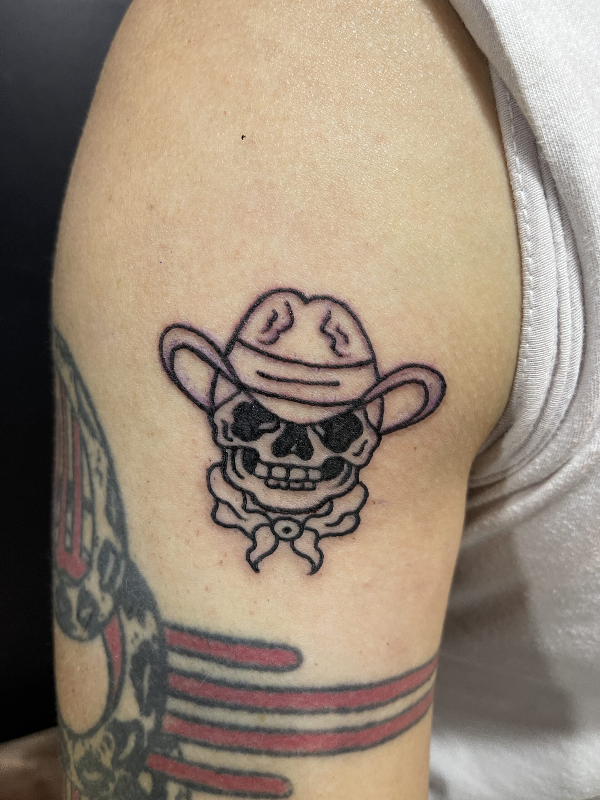 Black, Character, Arm Tattoo by Toon. He is a highly skilled tattoo artist at Lethal Ink Tattoo in Pattaya. He is celebrated for his expertise in Japanese, Chicano, Realistic, New School, Old School, Neo Thai, and Bamboo Tattooing. Toon, Black, Character, Arm Tattoo, Lethal Ink, Pattaya, 2024