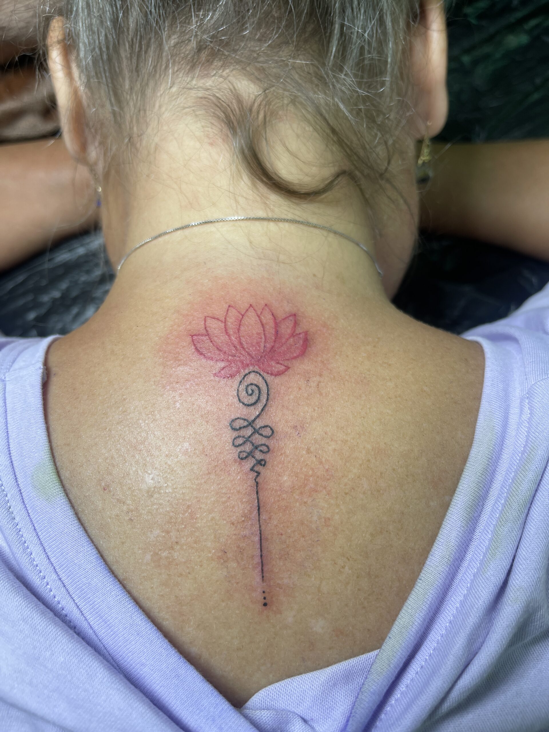 Sak Yant, Thai Traditional, Lotus Flower, Neck Tattoo. We have highly skilled tattoo artists at Lethal Ink Tattoo in Pattaya. We are known for Japanese, Chicano, Realistic, New School, Old School, Neo Thai, Blackwork, and Bamboo Tattooing. Sak Yant, Thai Traditional, Lotus Flower, Neck Tattoo, Lethal Ink, Pattaya, 2024