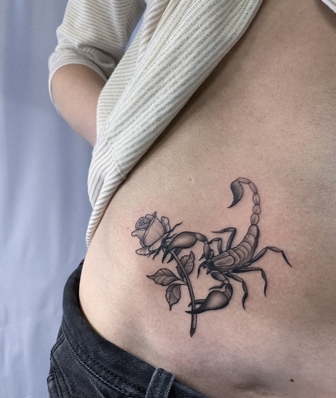Scorpion, Blackwork, Hip Tattoo by Alek. She is a highly skilled tattoo artist at Lethal Ink Tattoo in Pattaya. She is celebrated for her expertise in Japanese, BlackWork, and Abstract styles. Alek, Blackwork, Scorpion, Hip Tattoo, Lethal Ink, Pattaya, 2024