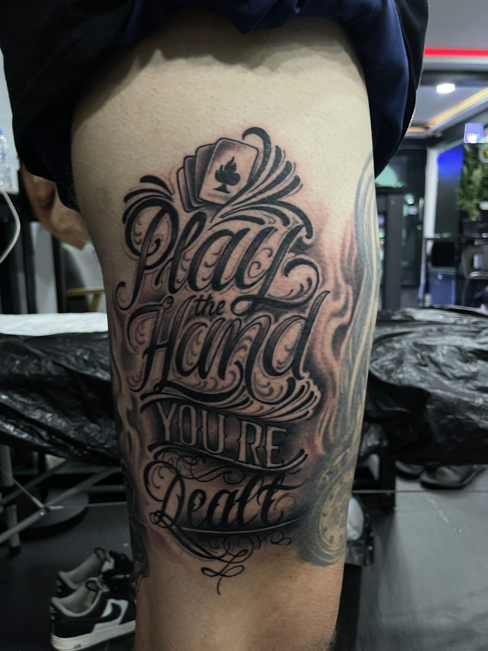Cards, Black and Grey, Leg Tattoo. We have highly skilled tattoo artists at Lethal Ink Tattoo in Pattaya. We are known for Japanese, Chicano, Realistic, New School, Old School, Neo Thai, Blackwork, and Bamboo Tattooing. Cards, Black and Grey, Leg Tattoo, Lethal Ink, Pattaya, 2024