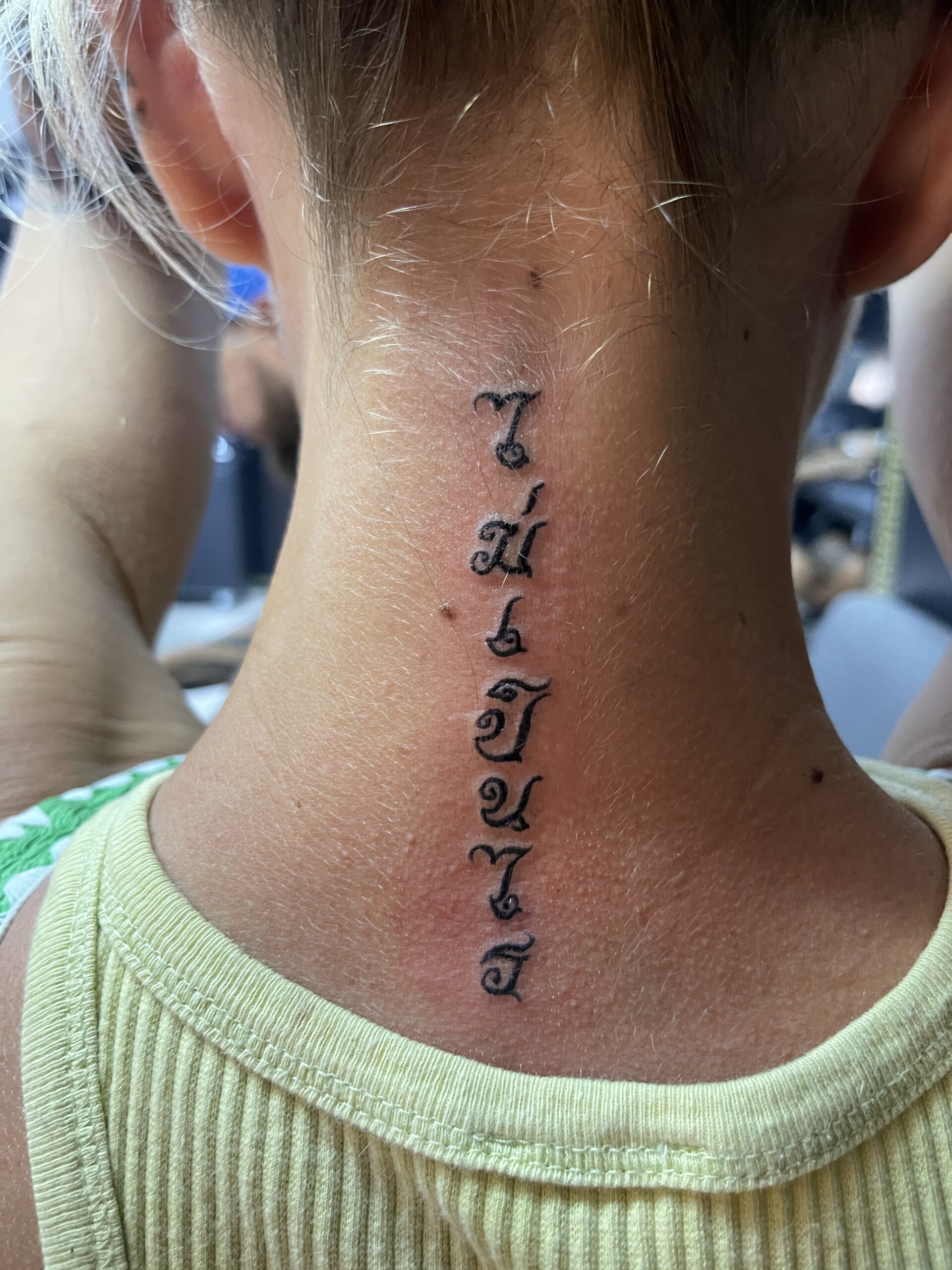 Thai Script, Thai Traditional, Neck Tattoo. We have highly skilled tattoo artists at Lethal Ink Tattoo in Pattaya. We are known for Japanese, Chicano, Realistic, New School, Old School, Neo Thai, Blackwork, and Bamboo Tattooing. Thai Script, Thai Traditional, Neck Tattoo, Lethal Ink, Pattaya, 2024