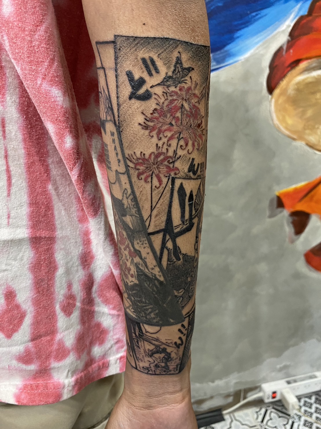 Anime, Black and Red, Scene, Forearm tattoo by Max. He is a highly skilled tattoo artist at Lethal Ink Tattoo in Pattaya. He is celebrated for is expertise in black and grey, anime, manga, Thai art, and tribal motifs. Anime, Black and Red, Scene, Forearm Tattoo, Max, Lethal Ink, Pattaya, 2024
