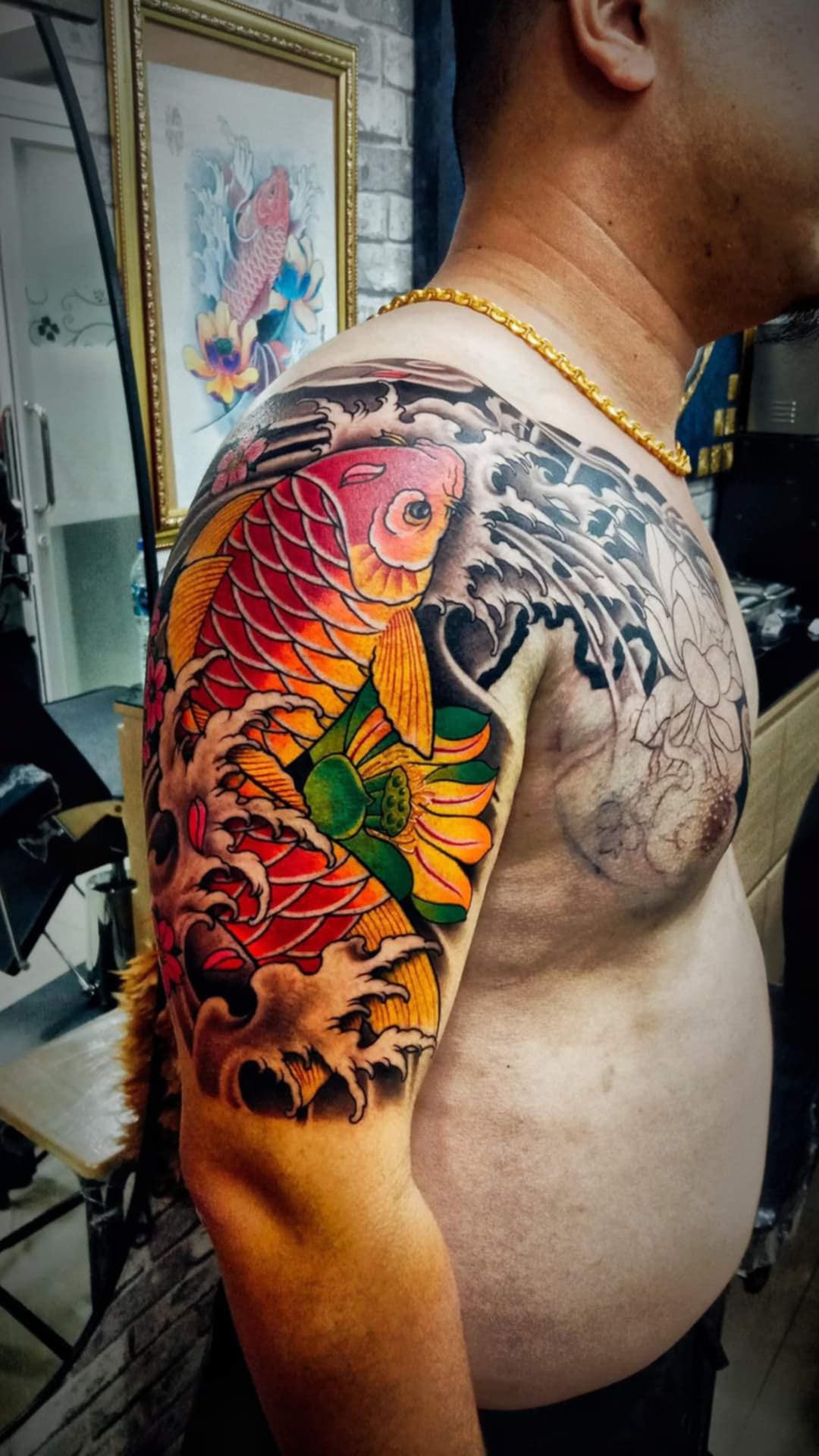 Koi Fish, Japanese Style, Half Arm Sleeve, Color Tattoo by Toon. He is a highly skilled tattoo artist at Lethal Ink Tattoo in Pattaya. He is celebrated for his expertise in Japanese, Chicano, Realistic, New School, Old School, Neo Thai, and Bamboo Tattooing. Koi Fish, Japanese Style, Half Arm Sleeve, Color, Toon Tattoo, Lethal Ink, Pattaya, 2024