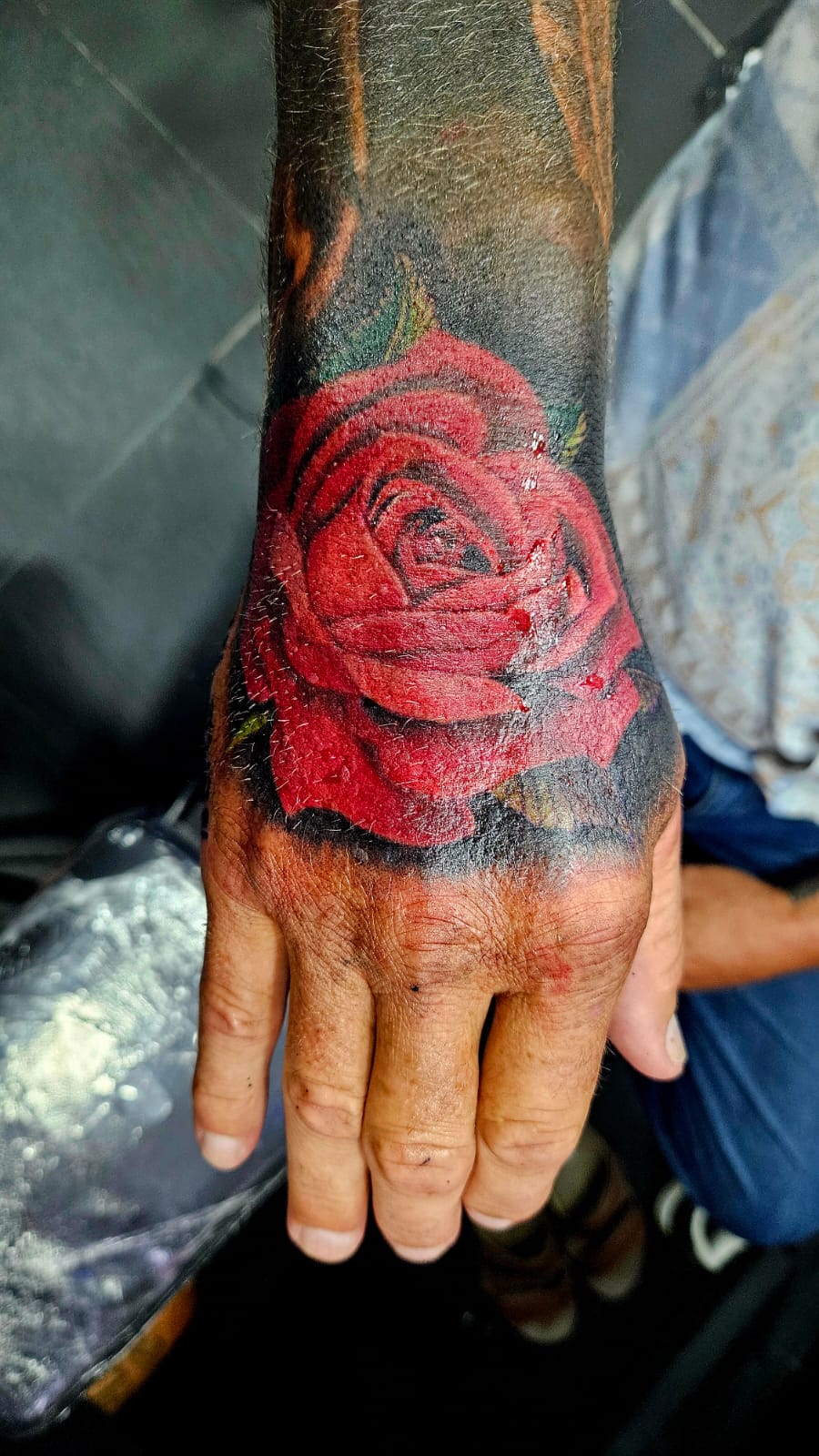 Rose, Red, Color, Realistic Style, Hand Tattoo by Toon. He is a highly skilled tattoo artist at Lethal Ink Tattoo in Pattaya. He is celebrated for his expertise in Japanese, Chicano, Realistic, New School, Old School, Neo Thai, and Bamboo Tattooing. Rose, Red, Color, Realistic Style, Hand Tattoo, Toon, Lethal Ink, Pattaya, 2024