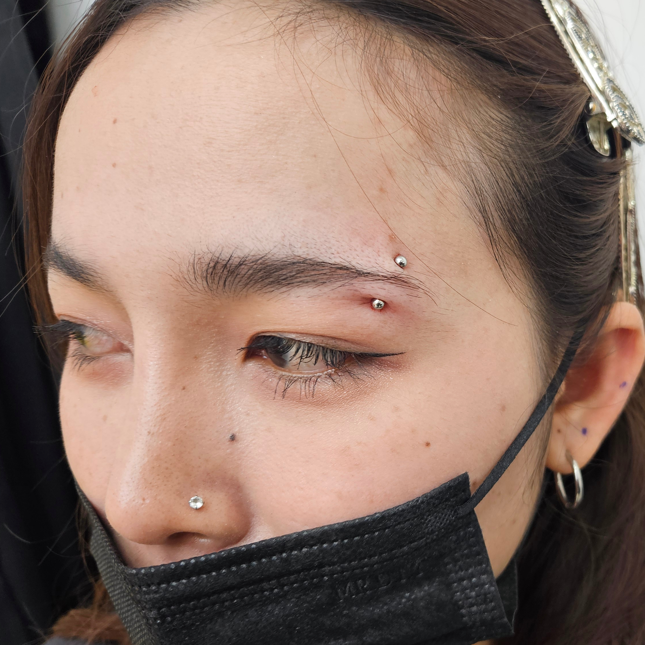 body-piercing-pattaya-eyebrow-lethal-ink-tattoo-studio