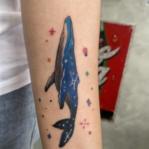 Whale, Color, Forearm Tattoo by Max. He is a highly skilled tattoo artist at Lethal Ink Tattoo in Pattaya. He is celebrated for is expertise in black and grey, anime, manga, Thai art, and tribal motifs. Max, Whale, Color, Forearm Tattoo, Lethal Ink, Pattaya, 2024