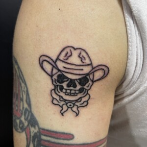 Black, Character, Arm Tattoo by Toon. He is a highly skilled tattoo artist at Lethal Ink Tattoo in Pattaya. He is celebrated for his expertise in Japanese, Chicano, Realistic, New School, Old School, Neo Thai, and Bamboo Tattooing. Toon, Black, Character, Arm Tattoo, Lethal Ink, Pattaya, 2024