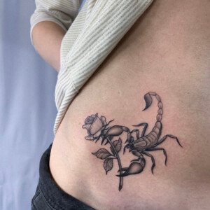 Scorpion, Blackwork, Hip Tattoo by Alek. She is a highly skilled tattoo artist at Lethal Ink Tattoo in Pattaya. She is celebrated for her expertise in Japanese, BlackWork, and Abstract styles. Alek, Blackwork, Scorpion, Hip Tattoo, Lethal Ink, Pattaya, 2024
