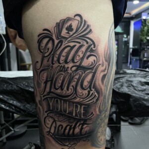Cards, Black and Grey, Leg Tattoo. We have highly skilled tattoo artists at Lethal Ink Tattoo in Pattaya. We are known for Japanese, Chicano, Realistic, New School, Old School, Neo Thai, Blackwork, and Bamboo Tattooing. Cards, Black and Grey, Leg Tattoo, Lethal Ink, Pattaya, 2024