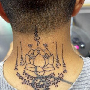 Sak Yant, Thai Traditional, Neck Tattoo by Toon. He is a highly skilled tattoo artist at Lethal Ink Tattoo in Pattaya. He is celebrated for is expertise in black and grey, anime, manga, Thai art, and tribal motifs. Toon, Sak Yant, Thai Traditional Neck Tattoo, Lethal Ink, Pattaya, 2024