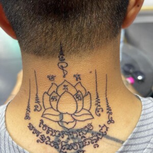 Sak Yant, Thai Traditional, Neck Tattoo by Toon. He is a highly skilled tattoo artist at Lethal Ink Tattoo in Pattaya. He is celebrated for is expertise in black and grey, anime, manga, Thai art, and tribal motifs. Toon, Sak Yant, Thai Traditional Neck Tattoo, Lethal Ink, Pattaya, 2024