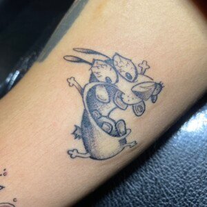 Ren, Cartoon, Black, Arm tattoo by Max. He is a highly skilled tattoo artist at Lethal Ink Tattoo in Pattaya. He is celebrated for is expertise in black and grey, anime, manga, Thai art, and tribal motifs. Ren, Cartoon, Black, Arm Tattoo, Max, Lethal Ink, Pattaya, 2024