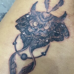 Demon, Mask, Black tattoo by Max. He is a highly skilled tattoo artist at Lethal Ink Tattoo in Pattaya. He is celebrated for is expertise in black and grey, anime, manga, Thai art, and tribal motifs. Demon, Mask, Black Tattoo, Max, Lethal Ink, Pattaya, 2024