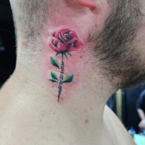 Rose, Red, Color, Realistic Style, Neck Tattoo by Toon. He is a highly skilled tattoo artist at Lethal Ink Tattoo in Pattaya. He is celebrated for his expertise in Japanese, Chicano, Realistic, New School, Old School, Neo Thai, and Bamboo Tattooing. Rose, Red, Color, Realistic Style, Neck Tattoo, Toon, Lethal Ink, Pattaya, 2024