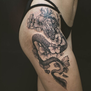 Japanese Style, Dragon, Sexy, Black and Gray, Thigh Tattoo by Toon. He is a highly skilled tattoo artist at Lethal Ink Tattoo in Pattaya. He is celebrated for his expertise in Japanese, Chicano, Realistic, New School, Old School, Neo Thai, and Bamboo Tattooing. Japanese Style, Dragon, Sexy, Black and Gray, Thigh Toon Tattoo, Lethal Ink, Pattaya, 2024