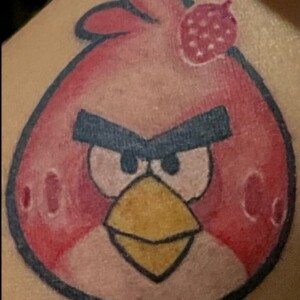 Angry Bird, Color, Couples Tattoo by Ron. He is a highly skilled tattoo artist at Lethal Ink Tattoo in Pattaya. He is Known for is expertise in Watercolor Fine Line, Tribal, Realistic, Irezumi, Neo Thai, Quote, Japanese, and Blackwork. Ron, Tattoo Artist, Lethal Ink Tattoo, Pattaya, 2024