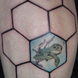 Geometric watercolor turtle tattoo on leg by Apple at Lethal Ink Tattoo, Pattaya. Apple specializes in Geometric, Watercolor, Animal, Color, and Custom tattoos. Geometric watercolor turtle tattoo on leg by Apple, tattoo artist at Lethal Ink Tattoo, Pattaya (2025)