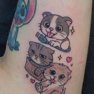 Memorial animated cat tattoo by Sandy at Lethal Ink Tattoo, Pattaya. Sandy specializes in Illustrative, Color, Neo Traditional, Realism, and Black & Grey styles. Memorial animated cat tattoo by Sandy, tattoo artist at Lethal Ink Tattoo, Pattaya (2025)